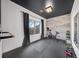 Home gym featuring an exercise bike, weights, and a dark ceiling with pot lights at 925 Upper Hembree Rd, Roswell, GA 30076