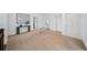 Expansive upstairs hallway with neutral carpet and abundant natural light at 925 Upper Hembree Rd, Roswell, GA 30076