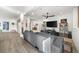 Comfortable living room with a large TV, modern decor, and an open layout at 925 Upper Hembree Rd, Roswell, GA 30076