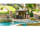 Built in bar area adjacent to the pool and jacuzzi at 925 Upper Hembree Rd, Roswell, GA 30076