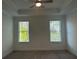 Bedroom featuring neutral carpet and trey ceiling at 102 Birch Tree Way, Cumming, GA 30040