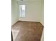 Cozy bedroom with neutral walls and carpet at 102 Birch Tree Way, Cumming, GA 30040