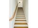 Stairway featuring hardwood steps with white risers at 102 Birch Tree Way, Cumming, GA 30040