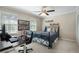Cozy bedroom with a desk and two sunny windows offering natural light at 105 Woodmeade Nw Way, Marietta, GA 30064