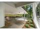 Carport featuring a concrete pad, with convenient access and enhanced functionality at 105 Woodmeade Nw Way, Marietta, GA 30064