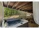 Relaxing hot tub area located in the backyard with wooded surroundings for privacy at 105 Woodmeade Nw Way, Marietta, GA 30064