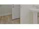 Full bathroom with a pedestal sink, and a door to the hallway at 1971 Sterling Oaks Cir, Brookhaven, GA 30319