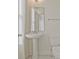 Small bathroom featuring a pedestal sink and white tile flooring at 1971 Sterling Oaks Cir, Brookhaven, GA 30319