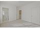 Clean and bright bedroom with a view of a bathroom at 1971 Sterling Oaks Cir, Brookhaven, GA 30319