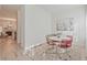 Bright dining area featuring a round table, modern chairs, and neutral decor at 1971 Sterling Oaks Cir, Brookhaven, GA 30319