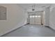 Spacious garage with a neutral color palette and ample space for parking at 1971 Sterling Oaks Cir, Brookhaven, GA 30319