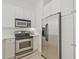 Well-appointed kitchen showcasing stainless steel appliances and ample storage space at 1971 Sterling Oaks Cir, Brookhaven, GA 30319