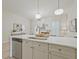 Spacious kitchen featuring a breakfast bar and seamless flow into the living area at 1971 Sterling Oaks Cir, Brookhaven, GA 30319