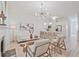 Bright, open-concept living room and kitchen with modern lighting and neutral decor at 1971 Sterling Oaks Cir, Brookhaven, GA 30319