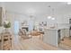 Sun-drenched living area featuring sleek hardwood floors and a cozy fireplace at 1971 Sterling Oaks Cir, Brookhaven, GA 30319