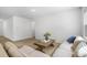 Comfortable and bright living room with hardwood floors and a neutral color palette at 4740 Alford Commons, Cumming, GA 30028