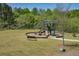 Community playground with slide, climbing wall and benches at 4740 Alford Commons, Cumming, GA 30028