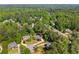 Aerial image showcasing a well-planned neighborhood nestled among mature trees and winding roads at 744 Edgewater Nw Ln, Kennesaw, GA 30144