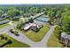 Community pool and tennis courts with lush landscaping, plus neighborhood homes and sidewalks at 744 Edgewater Nw Ln, Kennesaw, GA 30144