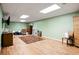 The basement has wood-look floors and recessed lighting at 744 Edgewater Nw Ln, Kennesaw, GA 30144