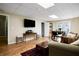 Spacious living room with hardwood floors and walkout to deck at 744 Edgewater Nw Ln, Kennesaw, GA 30144