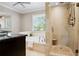 This bathroom has a luxurious tub and a separate tiled shower with built in seat at 744 Edgewater Nw Ln, Kennesaw, GA 30144