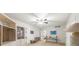 Neutral bedroom with built in shelves, a ceiling fan and ample open space at 815 Connell Ln, Lawrenceville, GA 30044