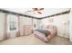 Cozy bedroom with bright natural light and decorative wallpaper border at 815 Connell Ln, Lawrenceville, GA 30044