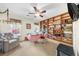 Bright bedroom with a ceiling fan and large built-in bookshelves providing ample storage at 815 Connell Ln, Lawrenceville, GA 30044