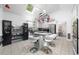 Spacious kitchen with a skylight, island with seating, stainless appliances, and tile floors at 815 Connell Ln, Lawrenceville, GA 30044