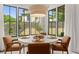 Charming dining area with large windows providing natural light and scenic views at 329 Mont Harmony Sw Rd, Powder Springs, GA 30127
