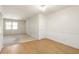 Combined carpeted living and dining room, with hardwood floors and bright natural light at 4282 Roswell Ne Rd # C3, Atlanta, GA 30342
