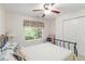 Neutral Bedroom with a view and closet at 219 Garden W Walk, Hampton, GA 30228