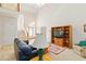 Spacious living room featuring a staircase, and lots of natural light at 219 Garden W Walk, Hampton, GA 30228