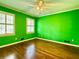 Bright bedroom with hardwood floors, and two large windows offering lots of natural light, providing comfort at 2603 Kings Lake Ne Ct, Atlanta, GA 30345