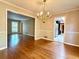 Bright dining room with chandelier and hardwood flooring at 2603 Kings Lake Ne Ct, Atlanta, GA 30345