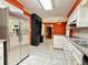 Well-equipped kitchen featuring stainless steel refrigerator and ample counter space at 2603 Kings Lake Ne Ct, Atlanta, GA 30345