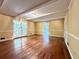 Comfortable living area with french doors and hardwood flooring at 2603 Kings Lake Ne Ct, Atlanta, GA 30345