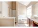 Bright bathroom featuring a tub/shower combination and modern fixtures, creating a functional space at 6396 Phillips Ct, Lithonia, GA 30058