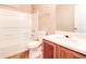 Bathroom featuring a tub with shower and single sink at 6396 Phillips Ct, Lithonia, GA 30058