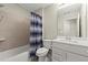 Clean bathroom featuring a shower/tub and single sink vanity at 809 Kirby Dr, Woodstock, GA 30188