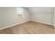 Bedroom featuring hardwood floors and a window at 809 Kirby Dr, Woodstock, GA 30188