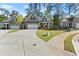 Charming home with brick and siding, two-car garage, and a well-manicured lawn in a great neighborhood at 809 Kirby Dr, Woodstock, GA 30188