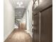 Open foyer showcasing hardwood floors and modern lighting at 809 Kirby Dr, Woodstock, GA 30188