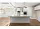 Open kitchen featuring a granite island, stainless appliances and breakfast area at 809 Kirby Dr, Woodstock, GA 30188