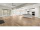 Open-concept living space with a kitchen island and lots of natural light at 809 Kirby Dr, Woodstock, GA 30188