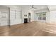 Bright and airy living room with a fireplace and sliding glass doors at 809 Kirby Dr, Woodstock, GA 30188