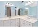 Bright bathroom with and sinks, vanity, and light-colored walls at 850 Madison Chase Way, Lawrenceville, GA 30045