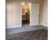 Cozy basement bedroom with neutral paint, a drop ceiling, and a patterned rug creating a relaxing atmosphere at 117 Manous Dr, Canton, GA 30115