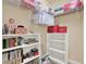 Walk-in closet featuring wire shelving and additional shelving for organizing clothes, toys and other accessories at 117 Manous Dr, Canton, GA 30115